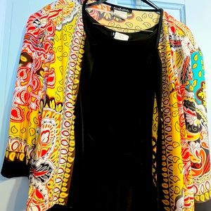 Long black dress with a very colorful jacket worn once